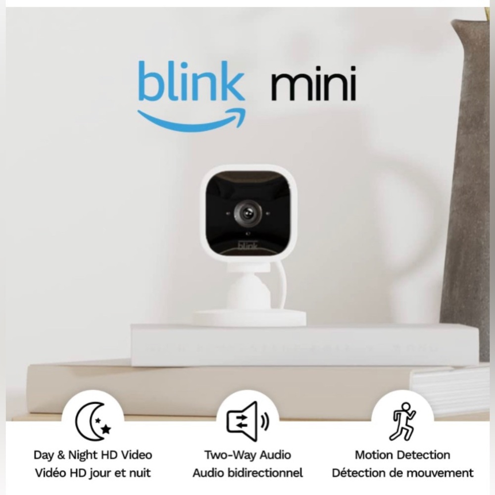 Blink Mini - Compact indoor plug-in smart security camera,
1080p HD